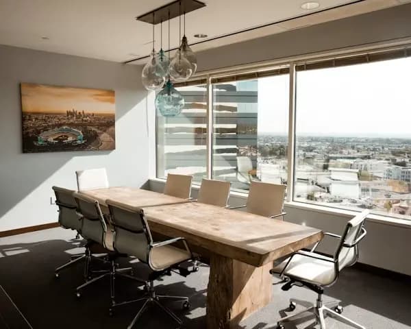 Modern office team workstation and glass meeting rooms layout