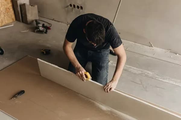 Active construction remodeling work upgrading home ceilings and walls